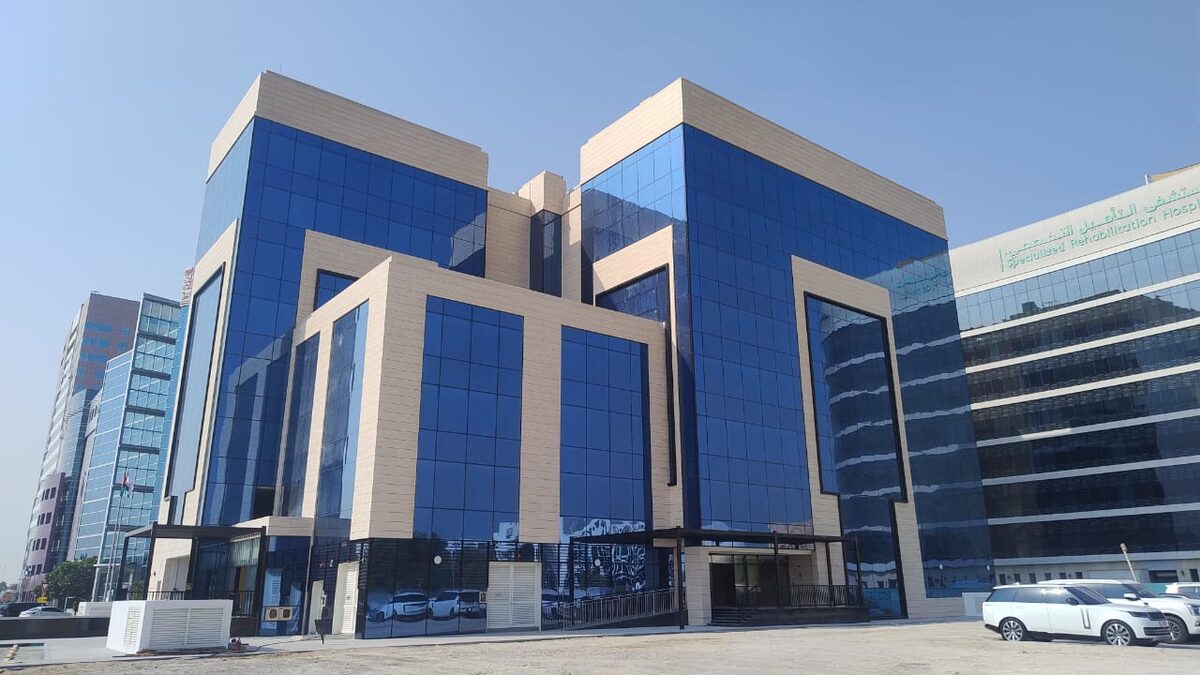 The Zakat Fund headquarters, a glass office building in Abu Dhabi.